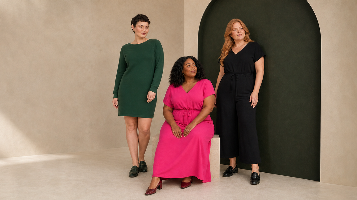 Three women wearing a forest-green straight dress, raspberry maxi dress and black wide-leg jumpsuit.