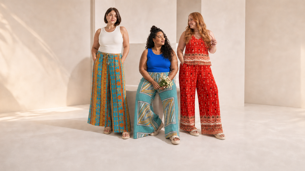 Three plus-size women in turquoise-orange, aqua scarf-panel and red tribal printed pleated outfits