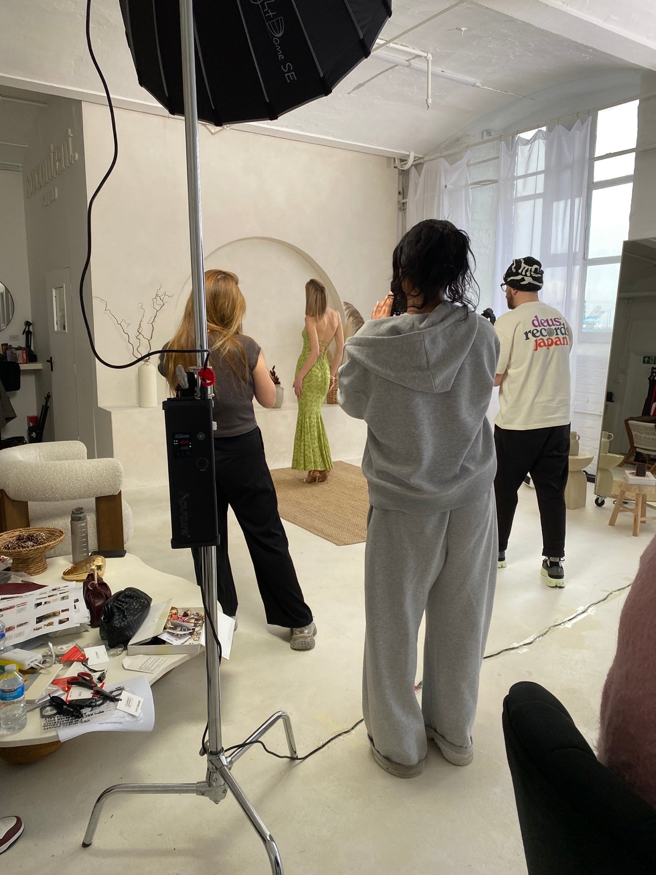 Fashion team working together on a studio photoshoot