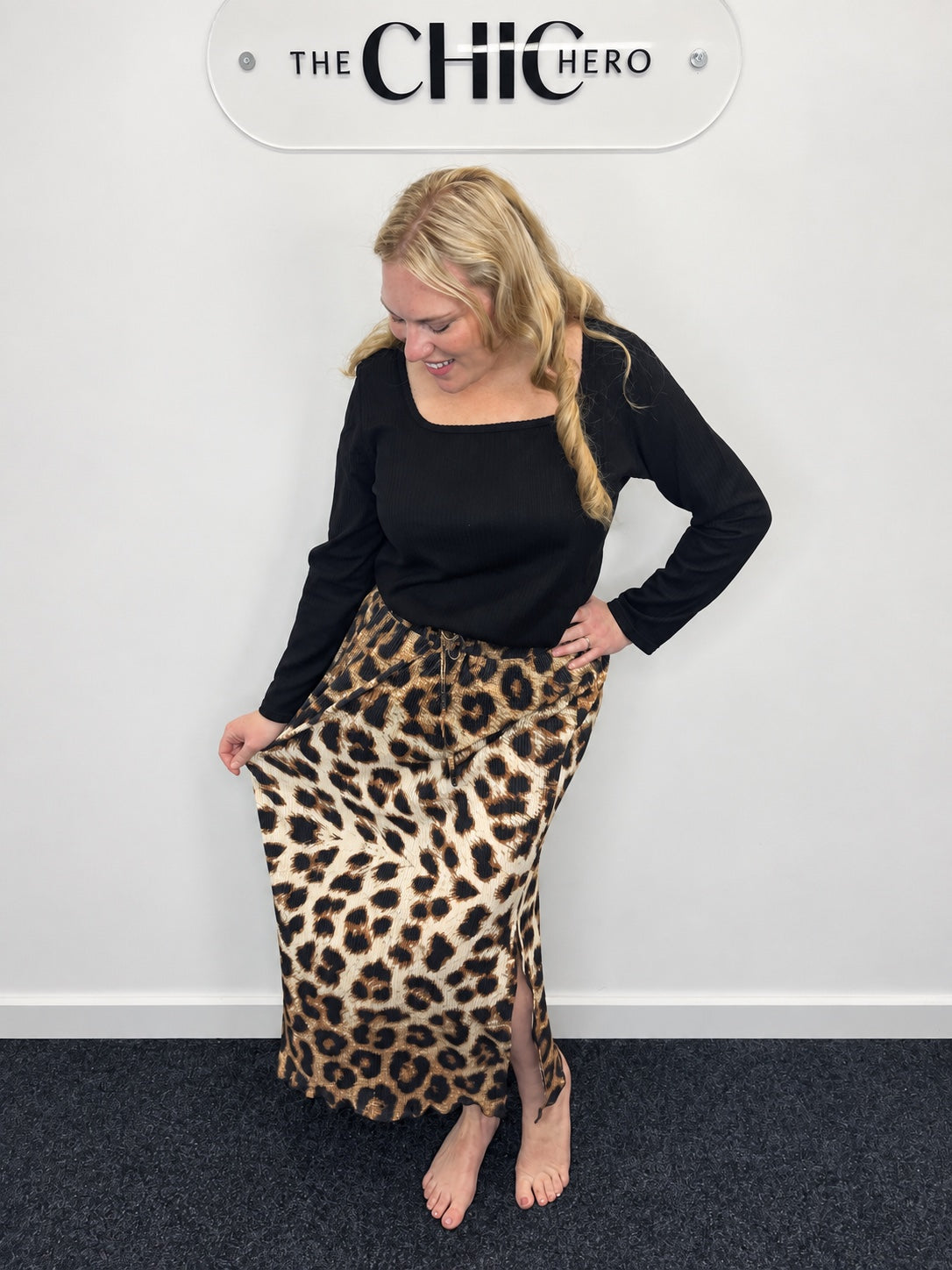 A model wearing leopard print in The Chic Hero studio