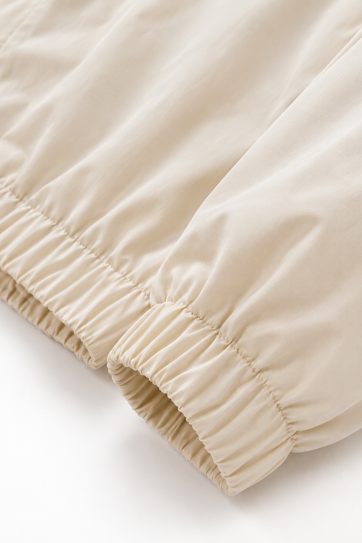 Elasticated cuff and hem detail on colour-block jacket