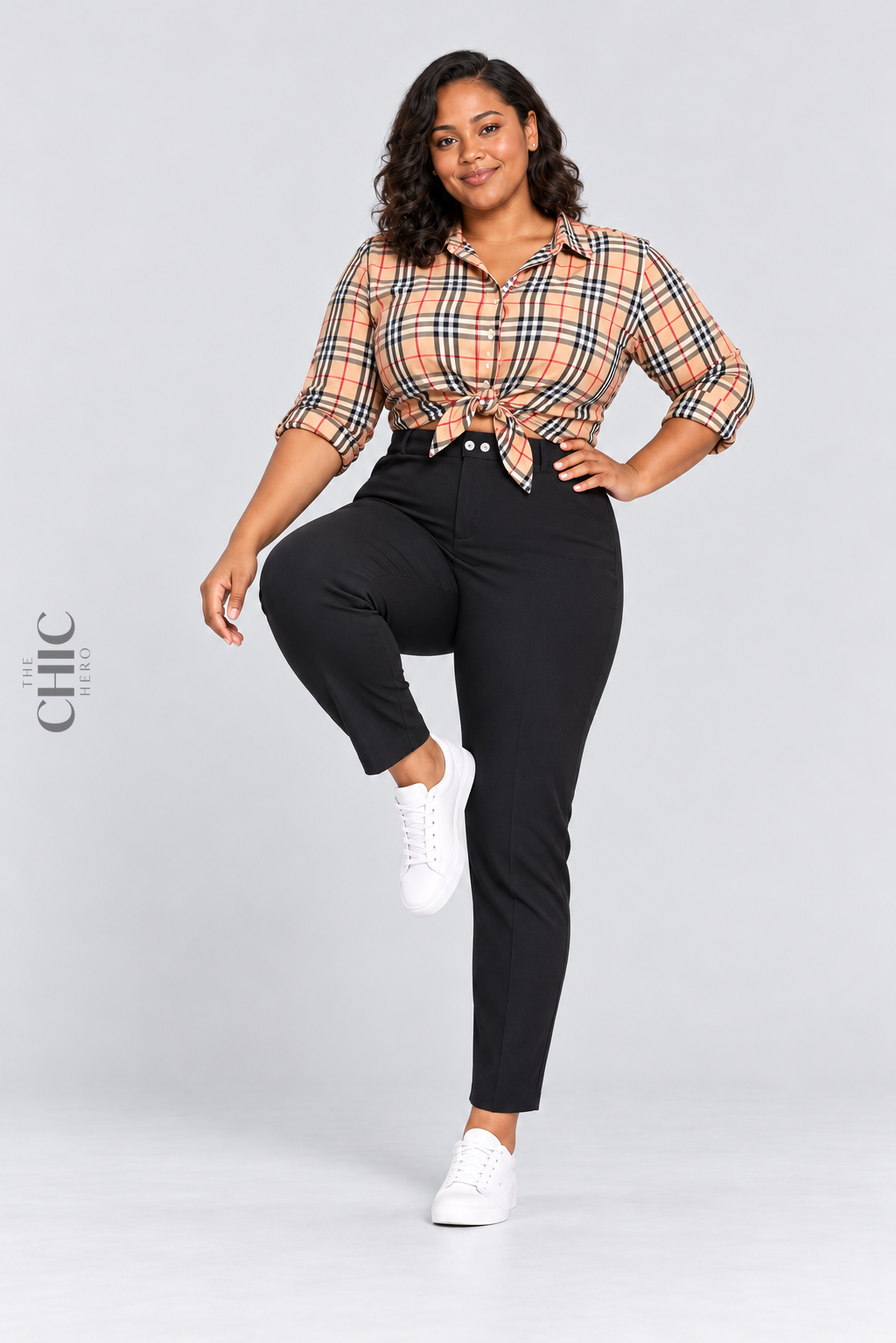 MODEL-03 demonstrating comfortable movement in black high-rise stretch pencil trousers with a natural front knee lift