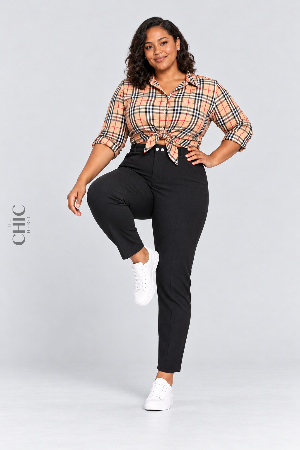 MODEL-03 demonstrating comfortable movement in black high-rise stretch pencil trousers with a natural front knee lift