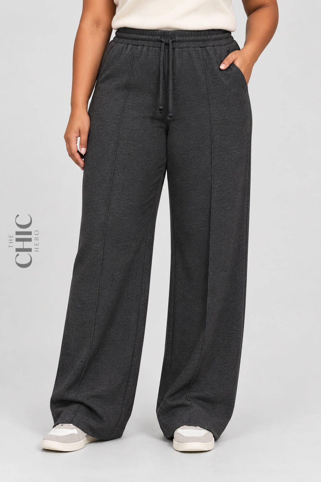 Women's dark grey plus size ribbed wide-leg trousers with a drawstring waist and side pockets