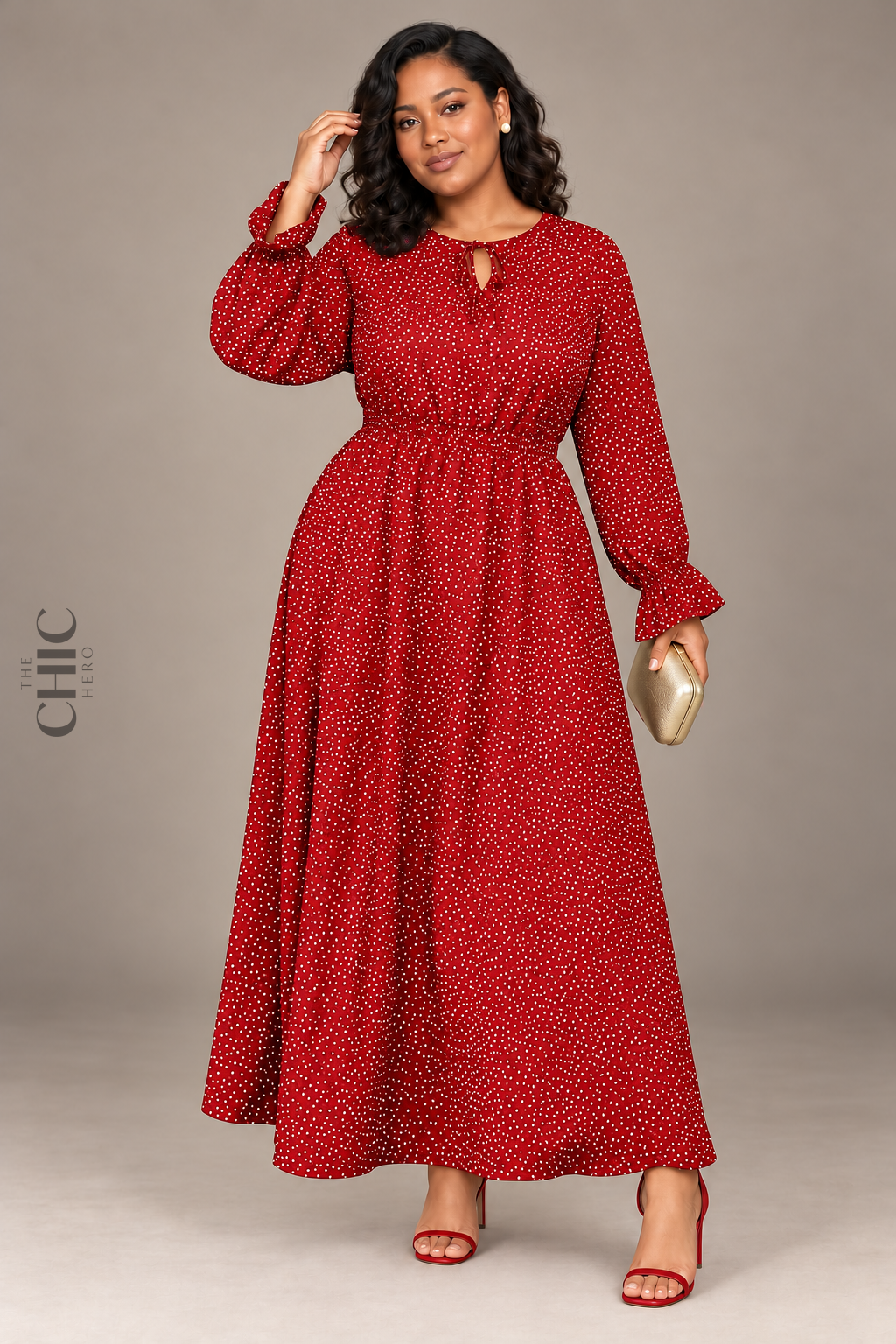 MODEL-03 wearing the Red long-sleeve polka-dot maxi dress with a gold clutch