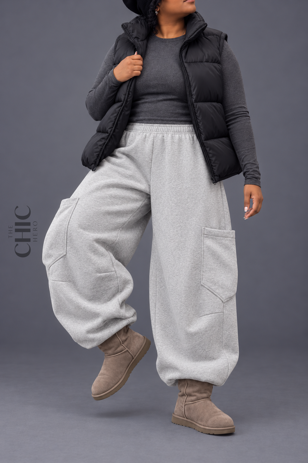Grey barrel-leg cargo joggers shown in a natural movement pose