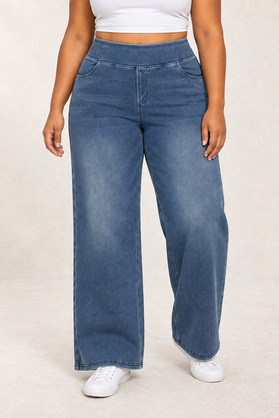 Model wearing wide-leg trousers