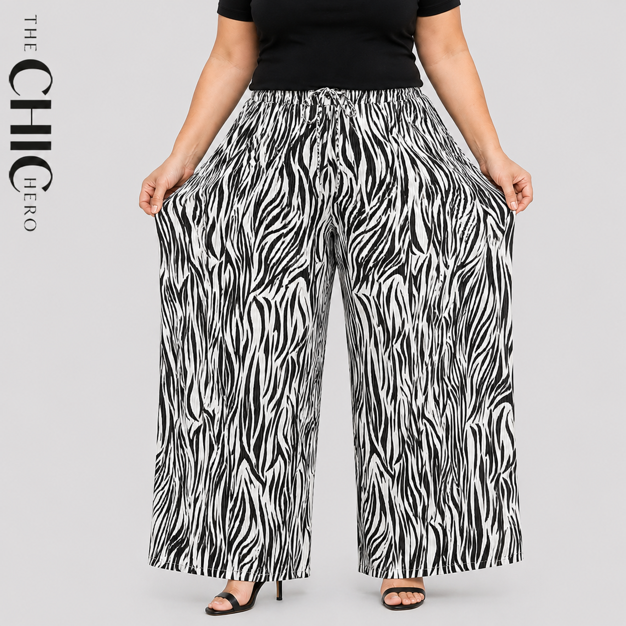 Plus Size Black & White Zebra Print Pleated Palazzo Pants with Elastic Drawstring Waist and Wide Leg Fit