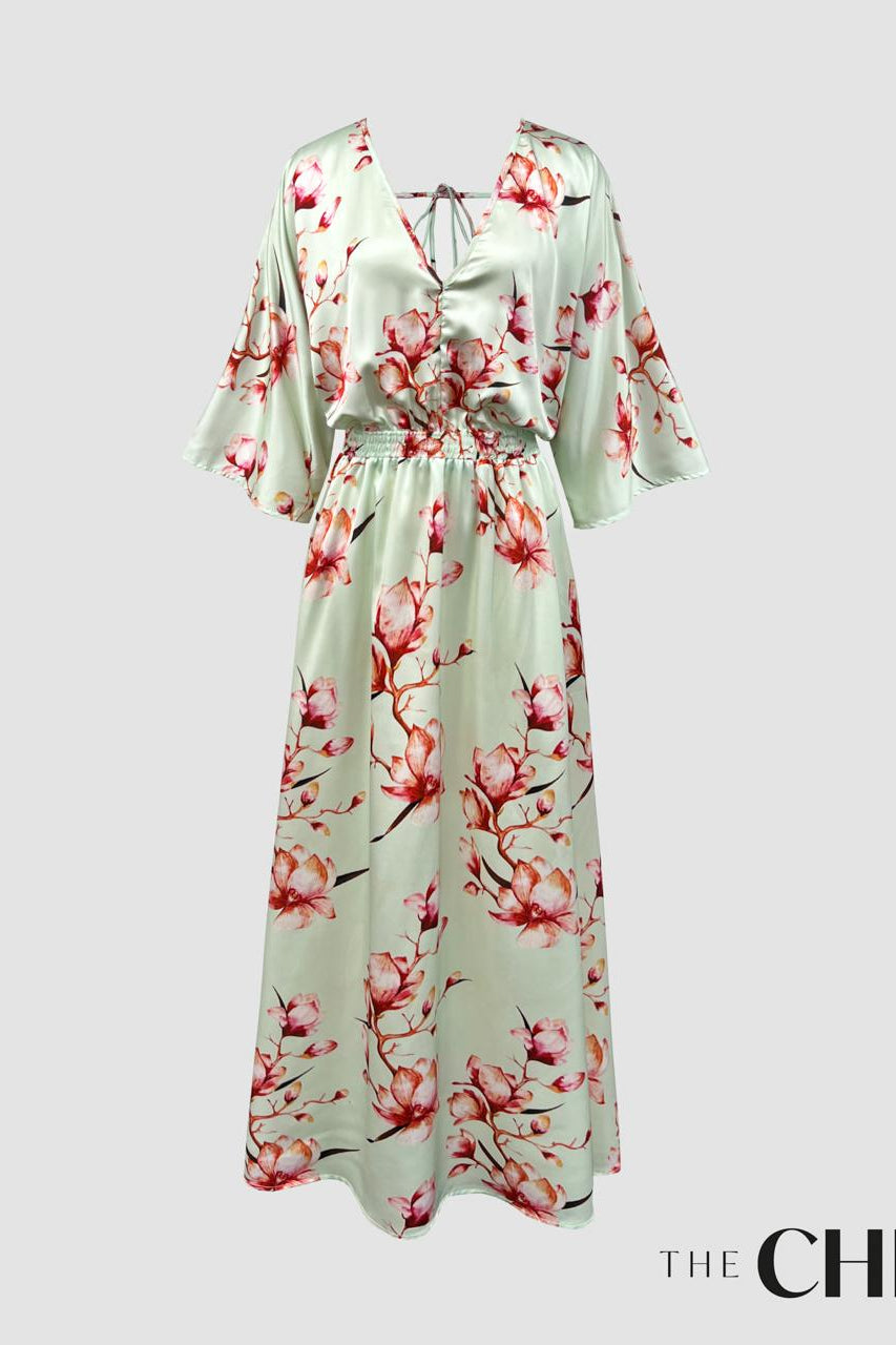 Long sleeve tie back maxi dress in floral print with a light solid color background, displayed on a white background with the brand name 'ChicHero' visible.