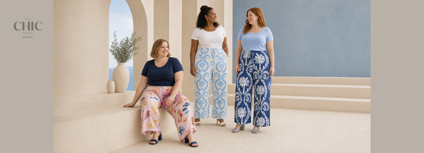 Three plus-size women wearing colourful pleated wide-leg trousers featuring ocean life, seashell and tropical palm prints with simple summer tops.