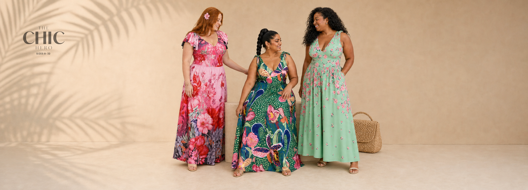 Three plus-size women wearing colourful floral one-piece swimsuits with coordinating long skirts in a warm summer studio