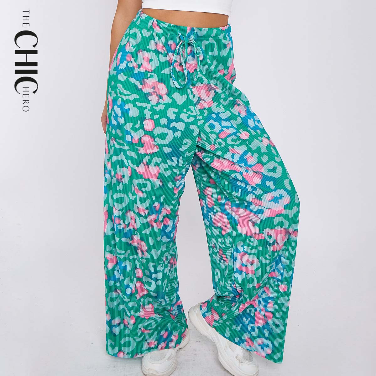Plus size female model in green print abstract wide-leg drawstring palazzo pants, stretchy opaque crease-resistant fabric, sizes UK 8–32