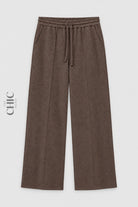 Coffee brown ribbed wide-leg trousers front view with drawstring waist and pockets