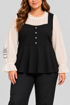The Chic Hero black and ivory faux-layered peplum top front view on a plus size model