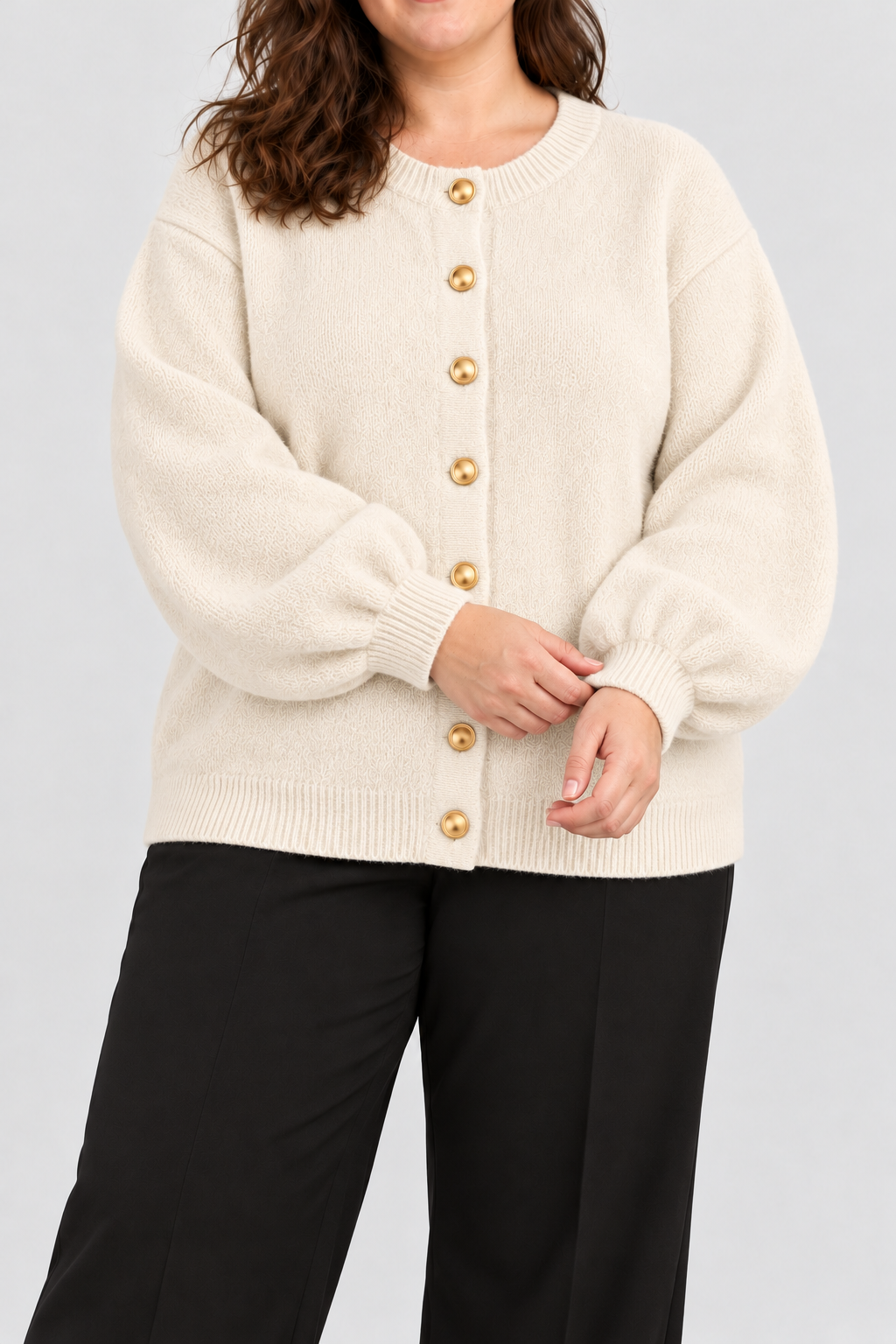 Cream gold-button balloon-sleeve cardigan on a faceless UK22 model