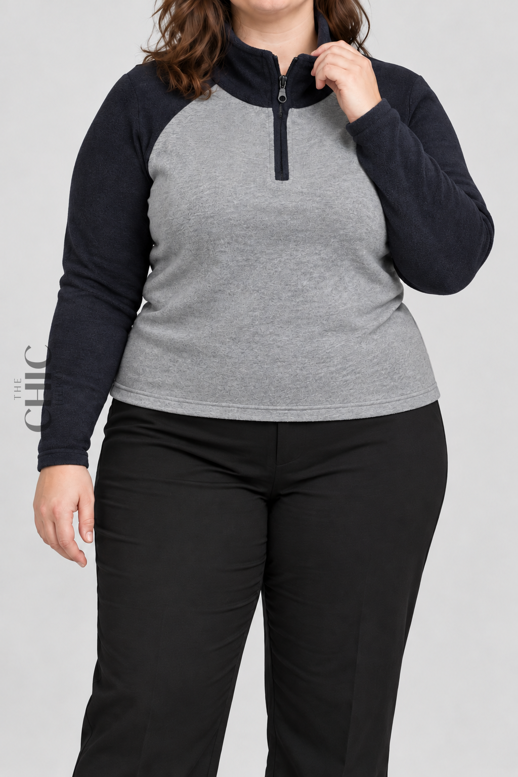 Navy colour-block fleece half-zip top front view on a UK22 model