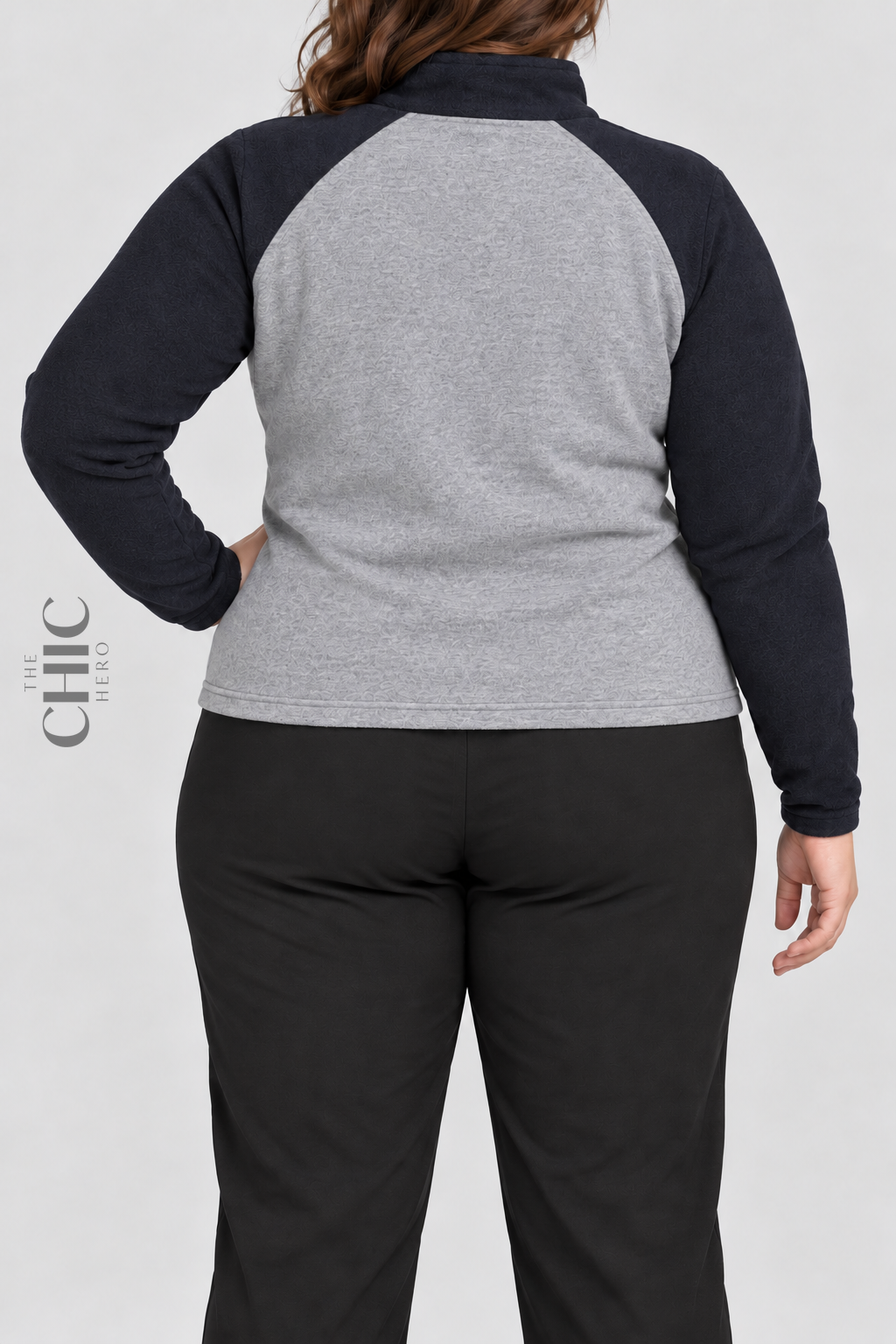 Navy colour-block fleece half-zip top back view on a UK22 model