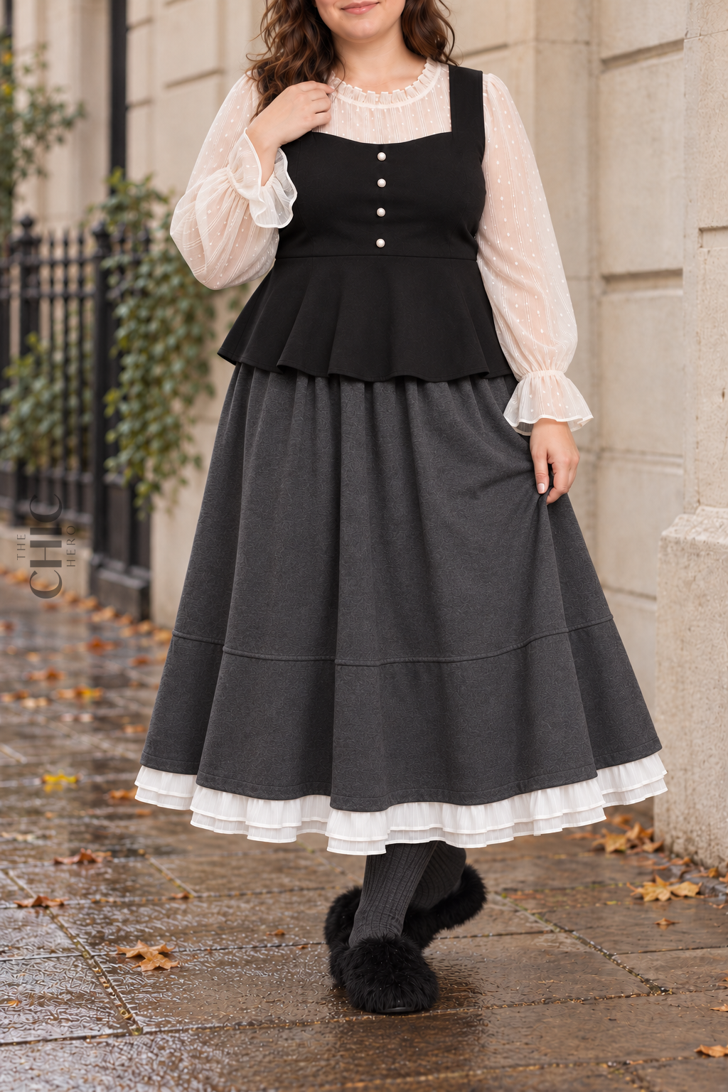 Charcoal Grey ruffle-hem maxi skirt shown in a different standing pose on a plus size model