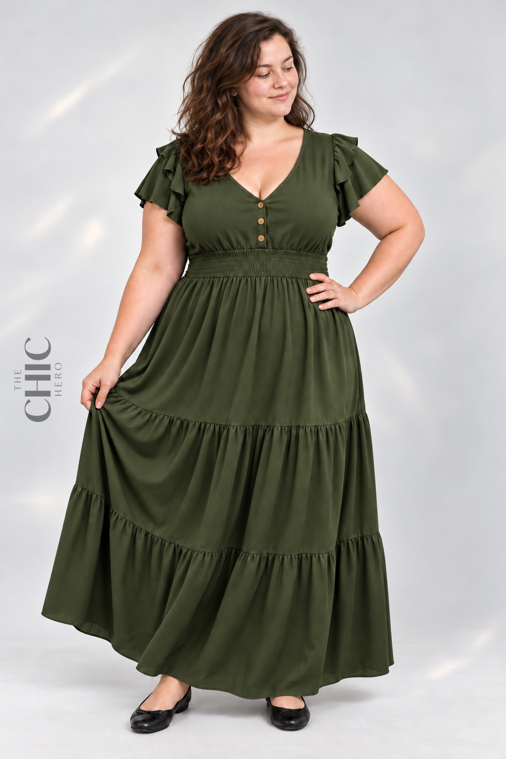 Green flutter sleeve shirred waist maxi dress on a UK22 model