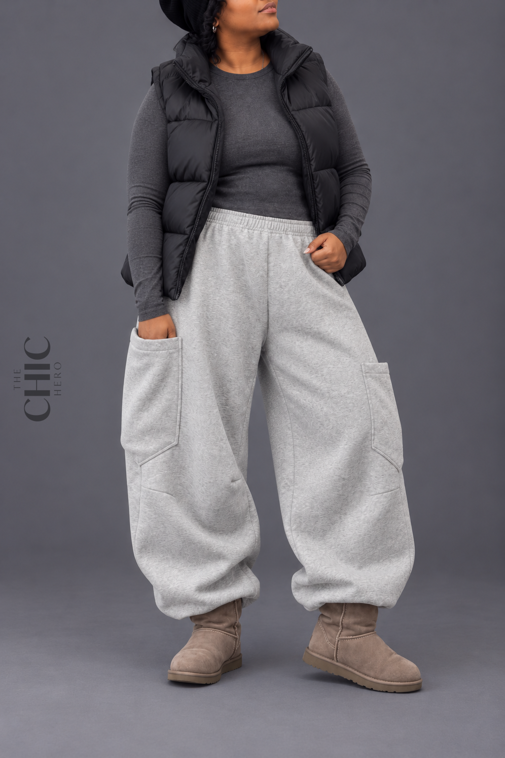 Oversized patch pocket detail on grey extra-wide barrel-leg cargo joggers