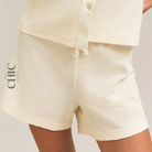 The Chic Hero Beige Textured Waffle Shorts – Resort front product image
