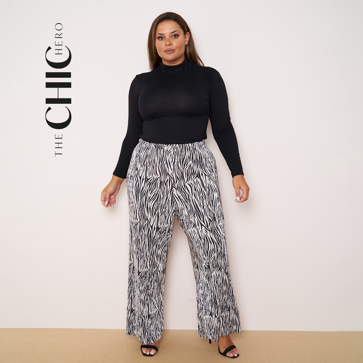 Plus Size Black & White Zebra Print Pleated Palazzo Pants with Elastic Drawstring Waist and Wide Leg Fit