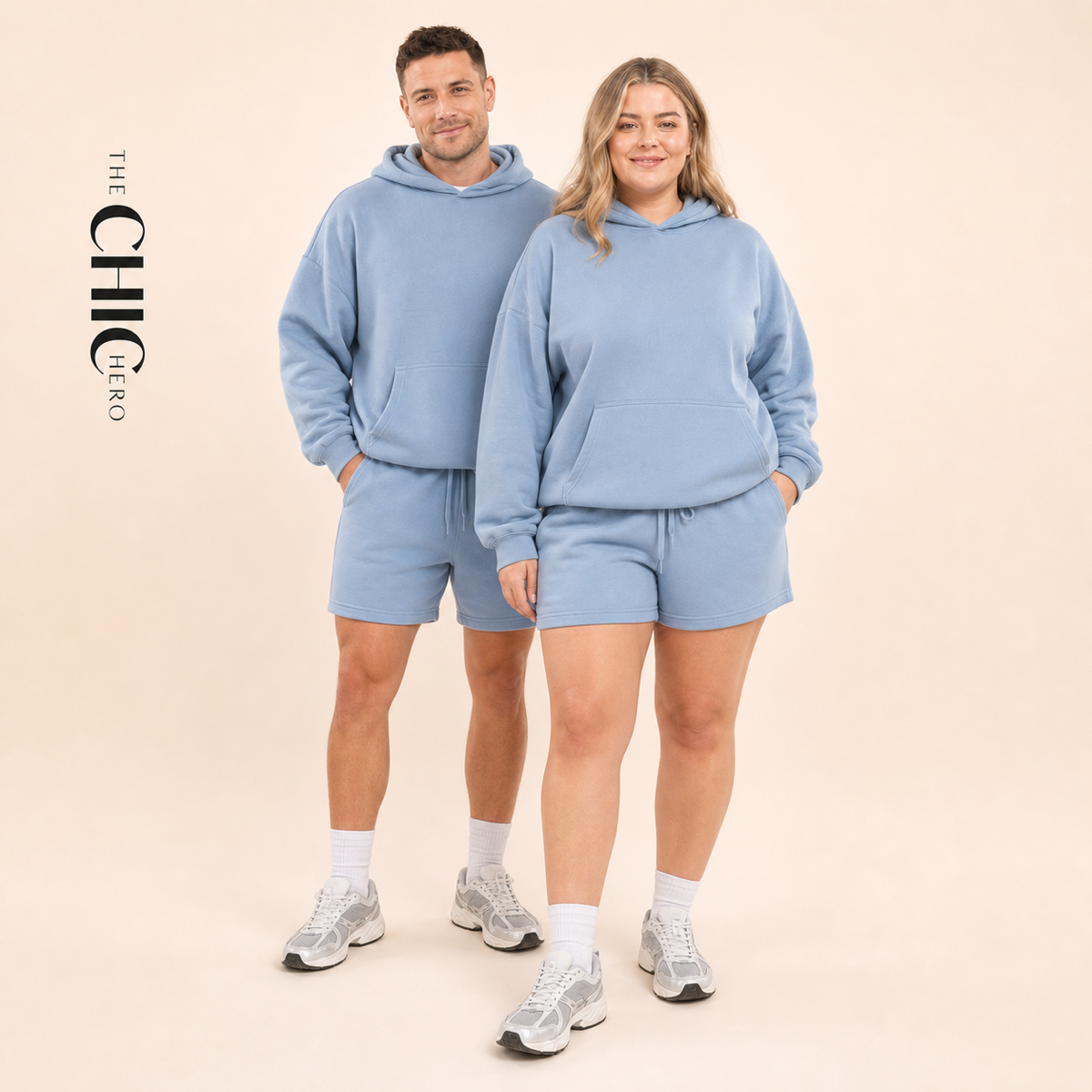 Male and female models wearing the ChicHero blue heavyweight hoodie and shorts