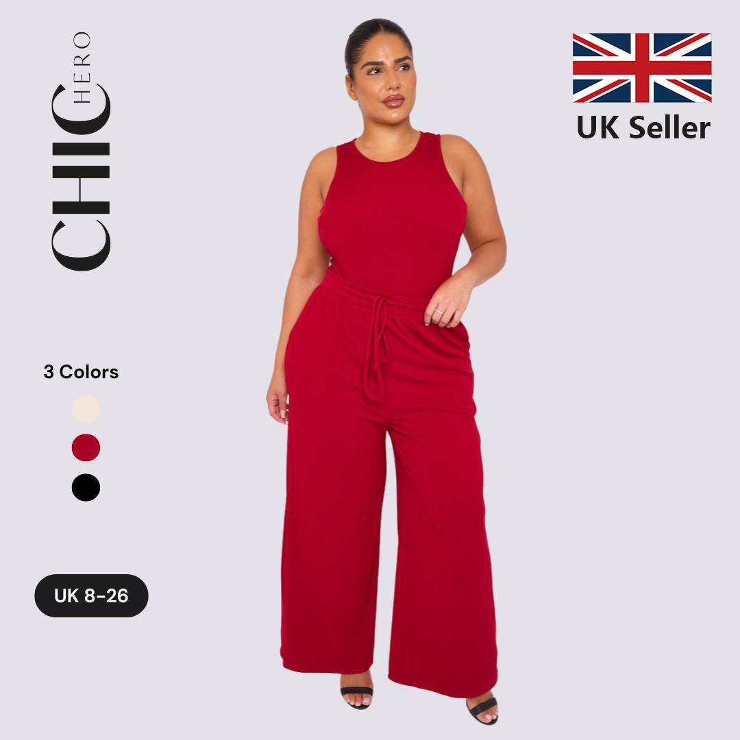 Woman wearing a red jumpsuit with 'Chic Hero' branding and UK seller flag on a light gray background.