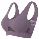 A dusty purple wireless sports bra with wide shoulder straps and breathable mesh side panels, shown on a solid white background.