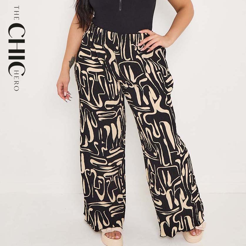 Plus size female model in black and beige statement abstract print wide-leg drawstring palazzo pants, stretchy opaque crease-resistant fabric, sizes UK 8–32