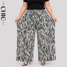 Plus Size Black & White Zebra Print Pleated Palazzo Pants with Elastic Drawstring Waist and Wide Leg Fit